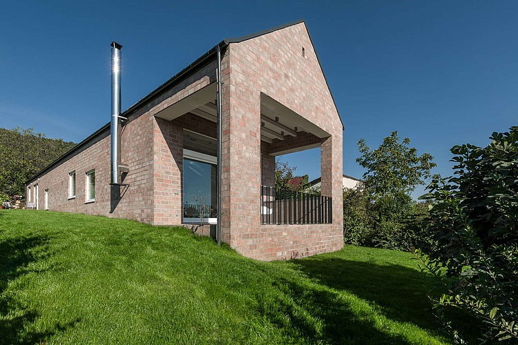 The Long Brick House by Foldes & Co. Architects