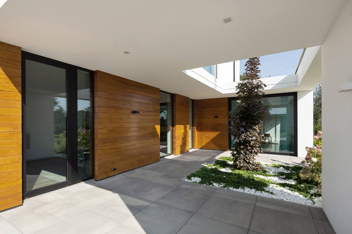 House with Niches by RS+ Robert Skitek