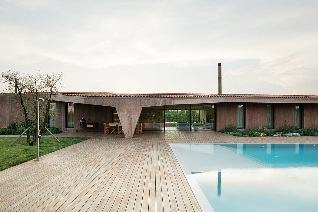 House with Swimming Pool by MIDE architetti - 1