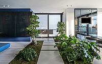 006-penthouse-embracing-green-contemporary-living-italy
