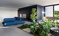 007-penthouse-embracing-green-contemporary-living-italy