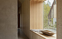 rorback-forest-retreat-a-modern-wooden-hideaway-00013