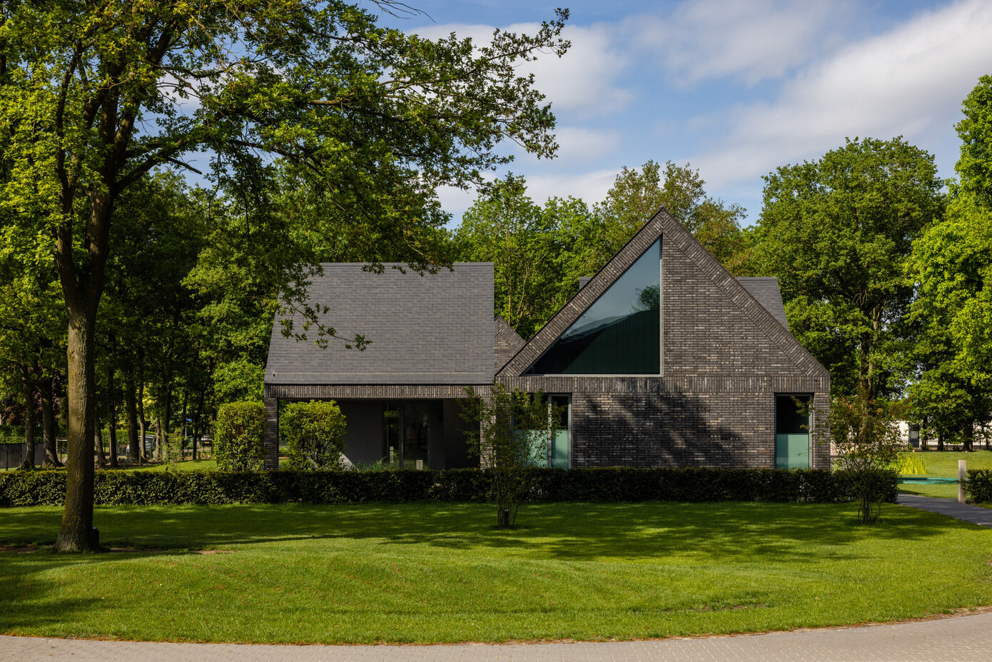 House with Four Roofs: Merging Modern Architecture with Rural Charm