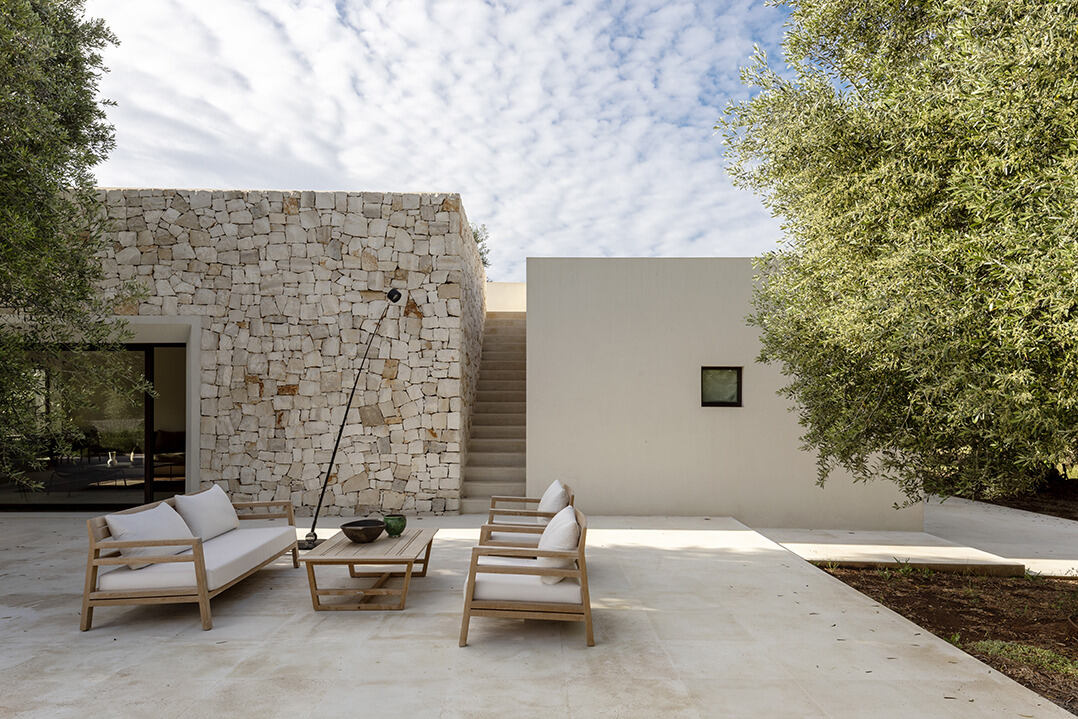 Casa 110: A Symphony of Stone and Sustainability