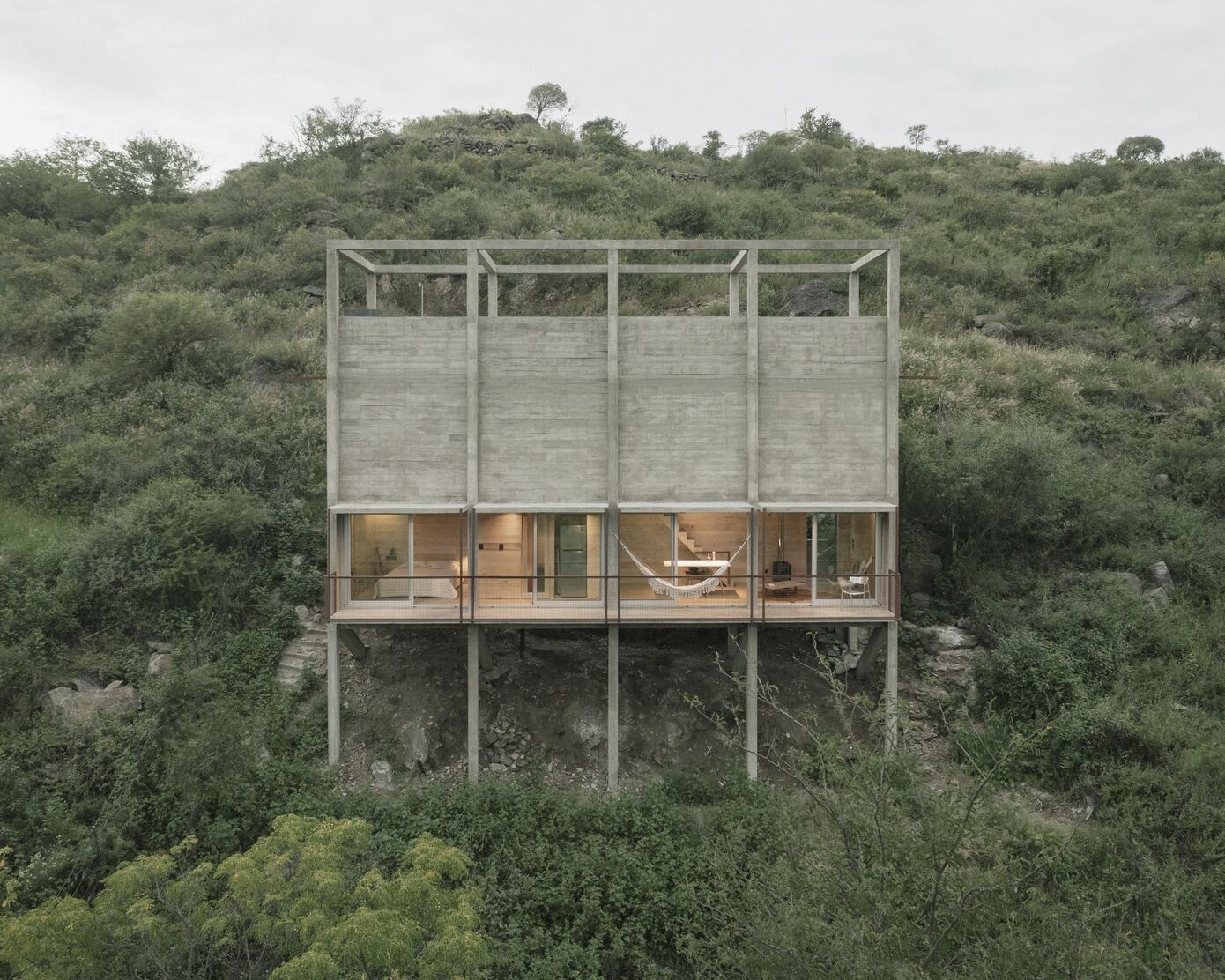 Casa Taller: Brutalist Harmony with Nature