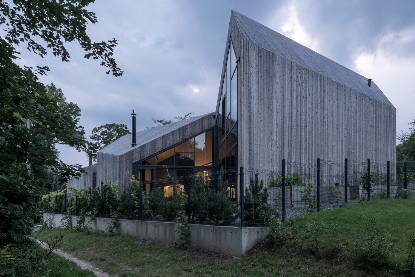 Residential House in Vilnius: A Wooden Urban Oasis