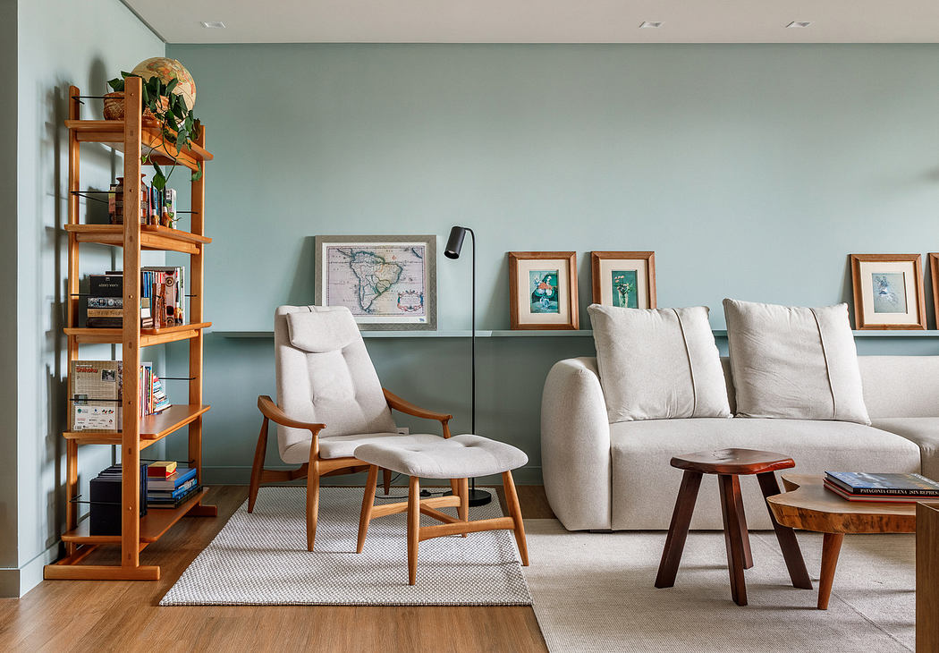 Modern living room with wooden furniture and pastel walls.