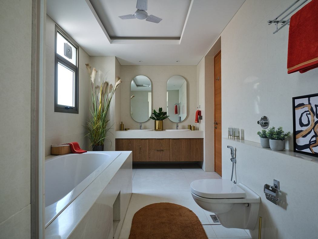 Modern bathroom with wooden vanity, dual mirrors, and white fixtures.