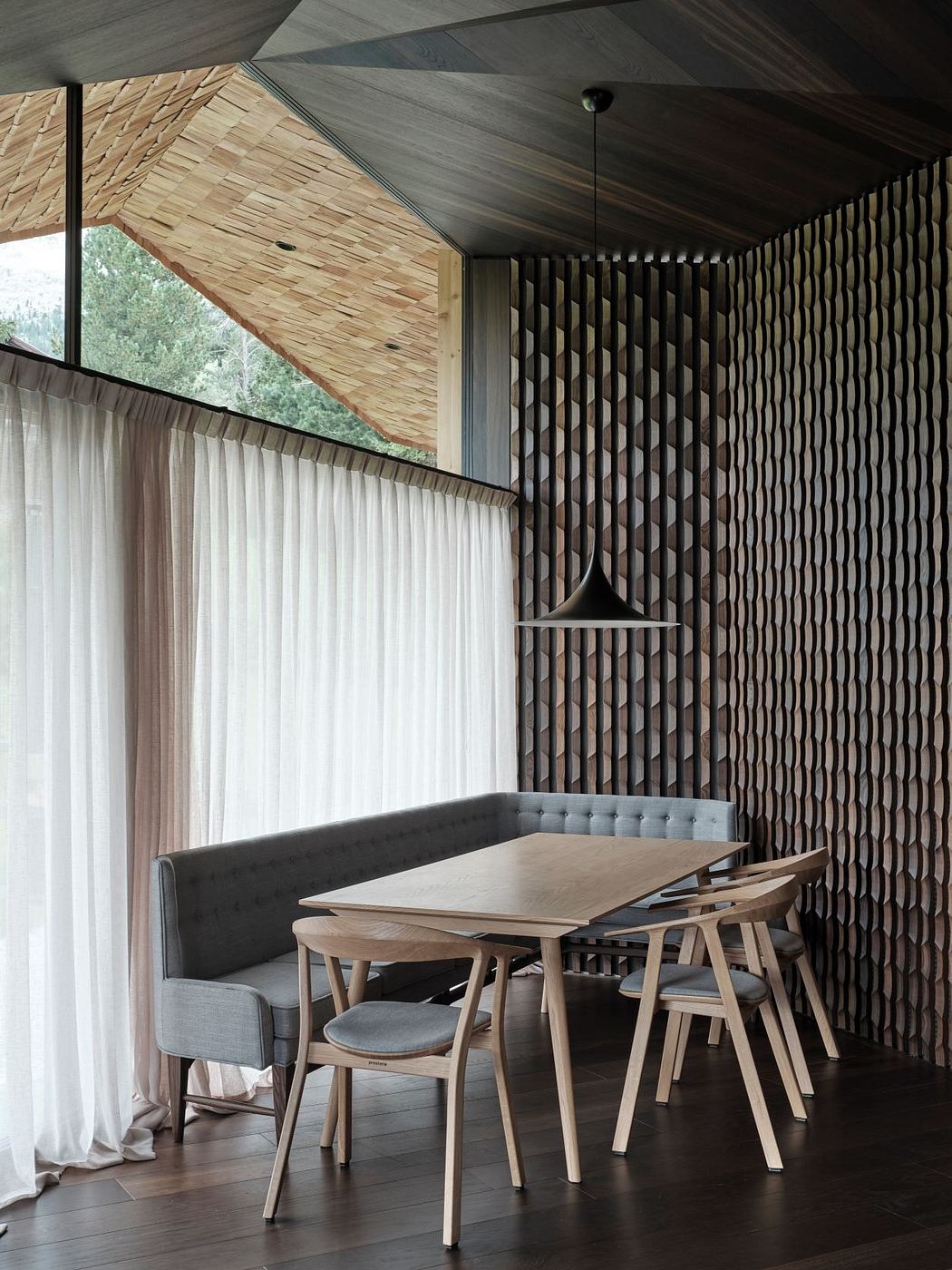Modern dining area with wooden furniture and textured wall design.
