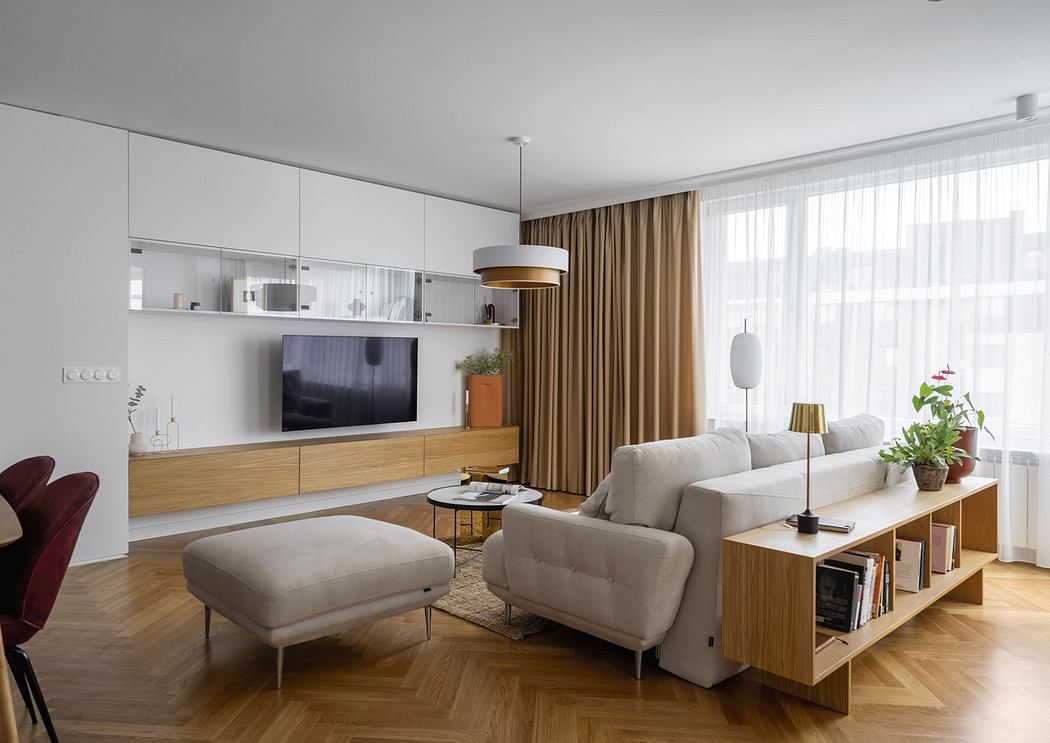 Modern living room with sleek furniture and wooden accents.