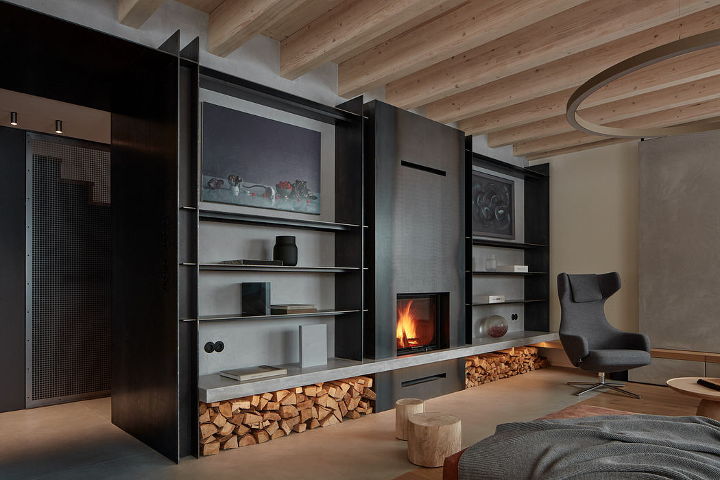 Modern living room with sleek fireplace and wood storage.