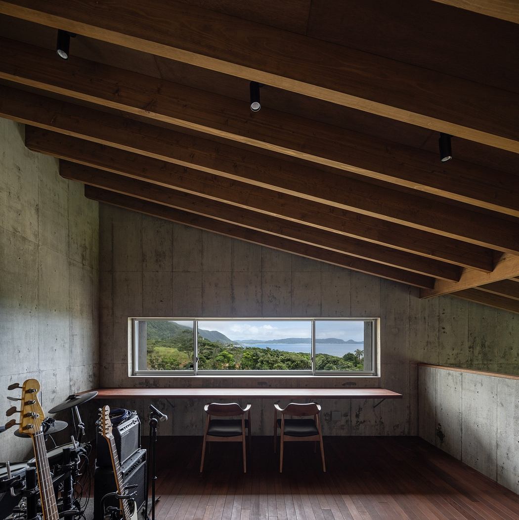 Minimalist room with wooden ceiling, concrete walls, and a scenic window view.