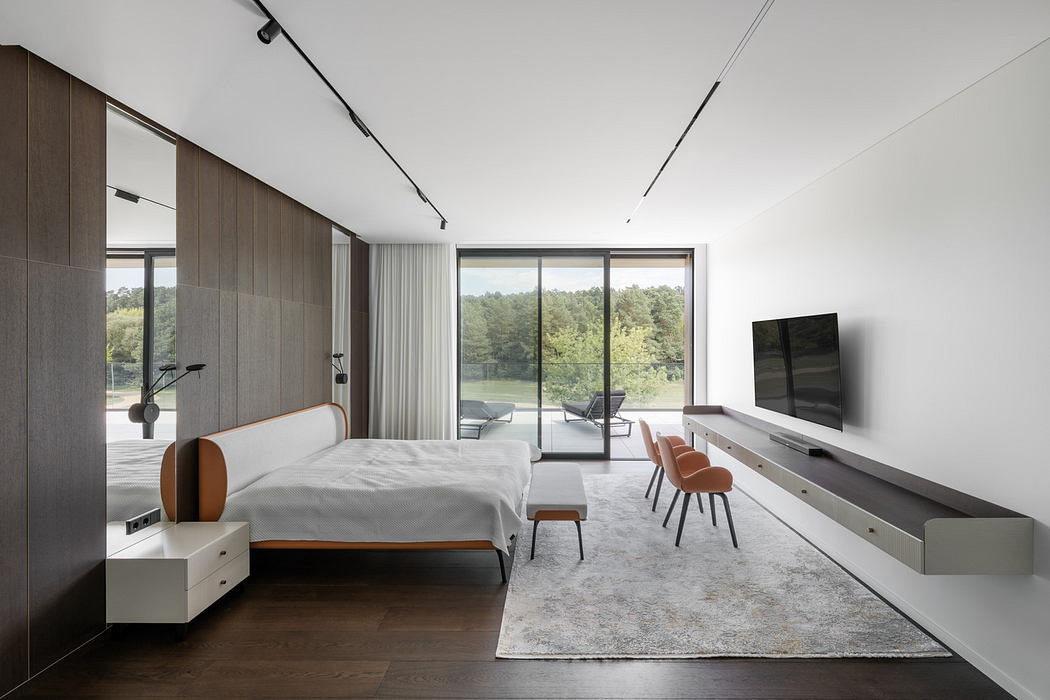 Modern bedroom with minimalistic furniture, large window, and wood accents.