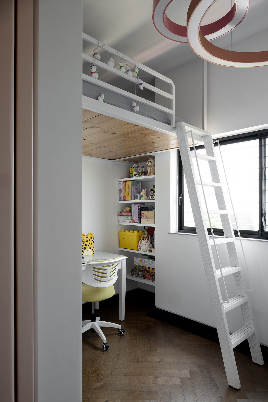 Modern small room with loft bed, desk and chair, and storage shelves.