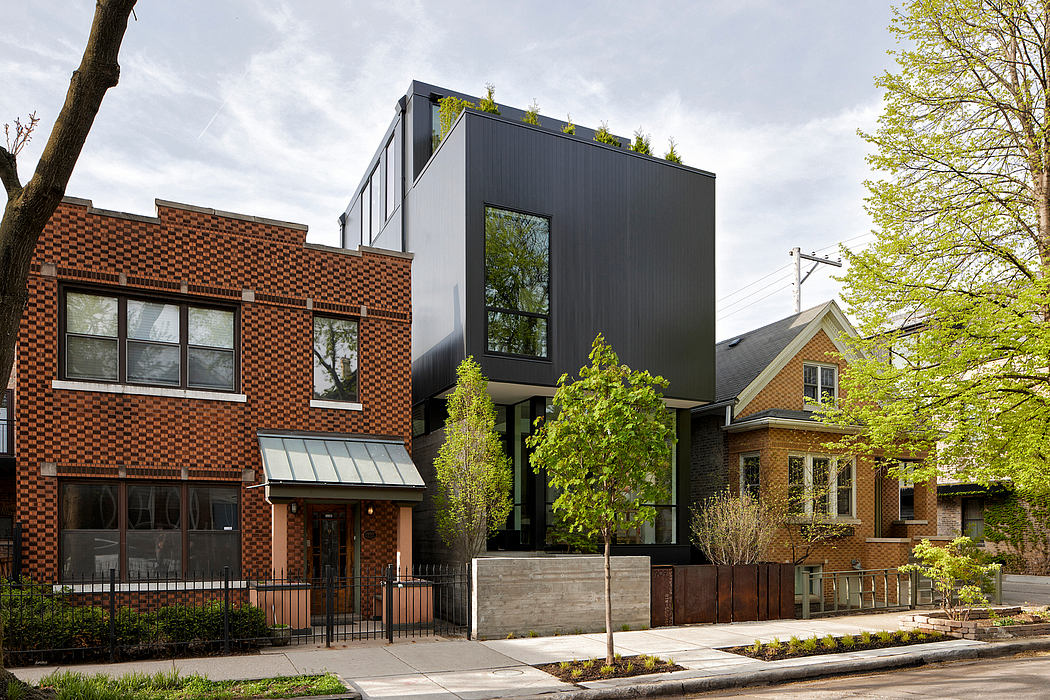 House 1909: Integrating Metal Clad Boxes for Chic Living