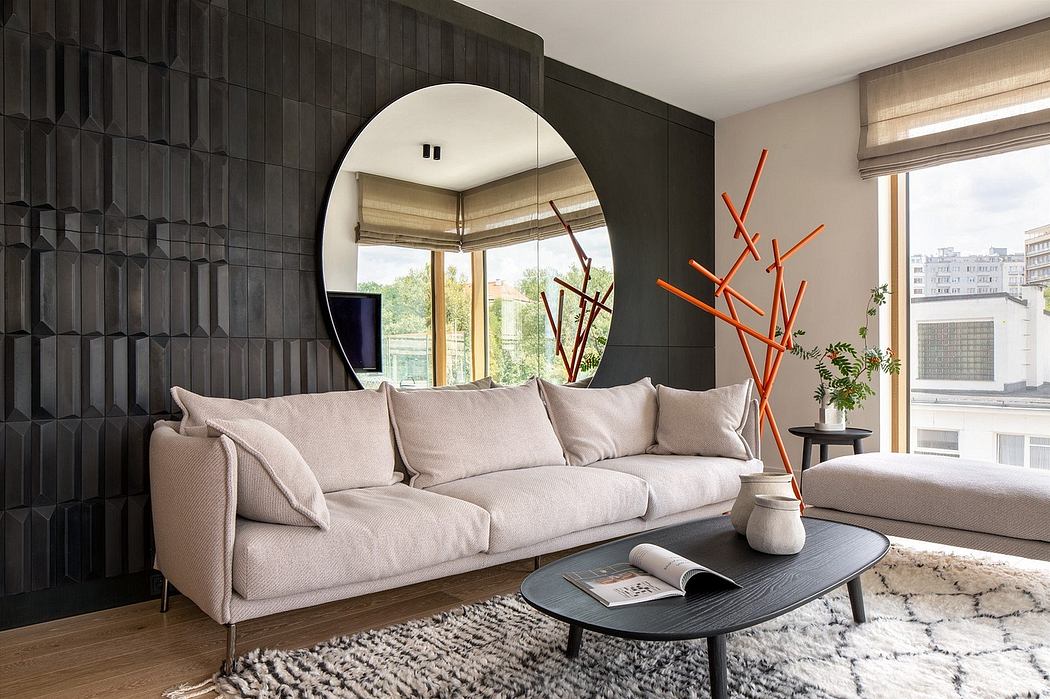 Contemporary living room with textured black wall and large circular mirror.