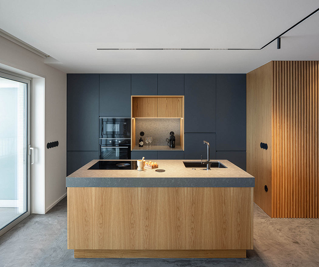 Contemporary kitchen with wood accents and minimalist decor.