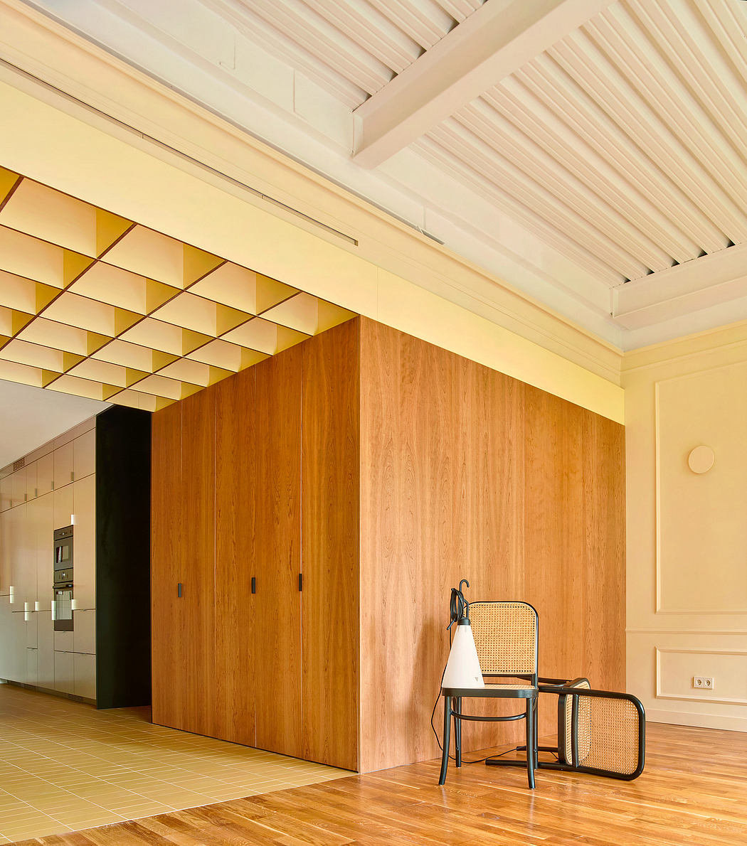 Contemporary interior with wooden paneling, coffered ceiling, and minimalist chair