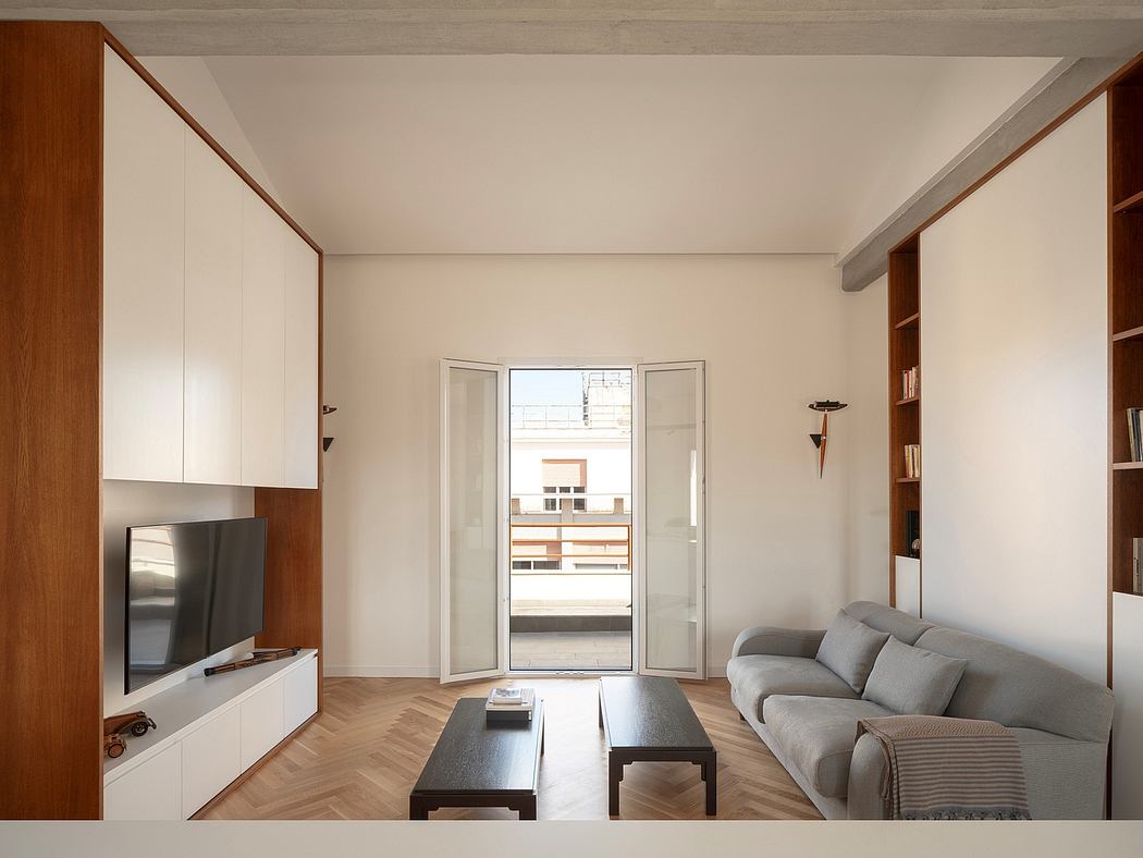 Minimalist living room with wooden features and neutral tones.