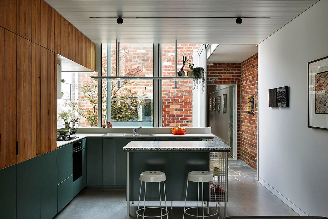 Contemporary kitchen with exposed brick and wooden cabinetry.