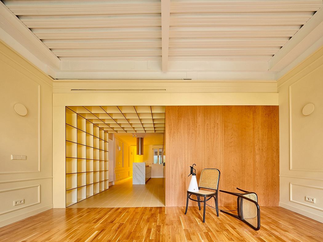 Modern room with wooden floors, beige walls, and a large wooden sliding door.