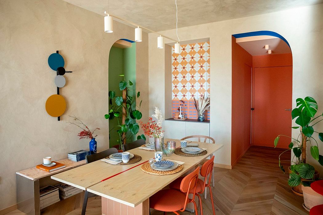 Modern dining room with colorful decor and plants.