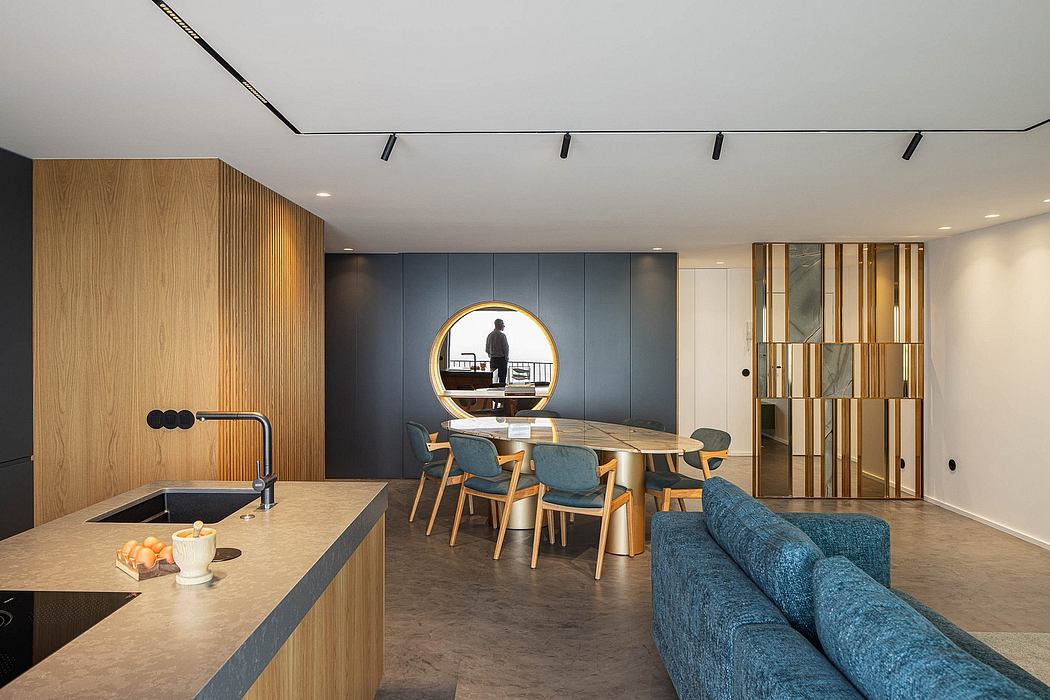 Contemporary apartment interior with wood accents and circular window.