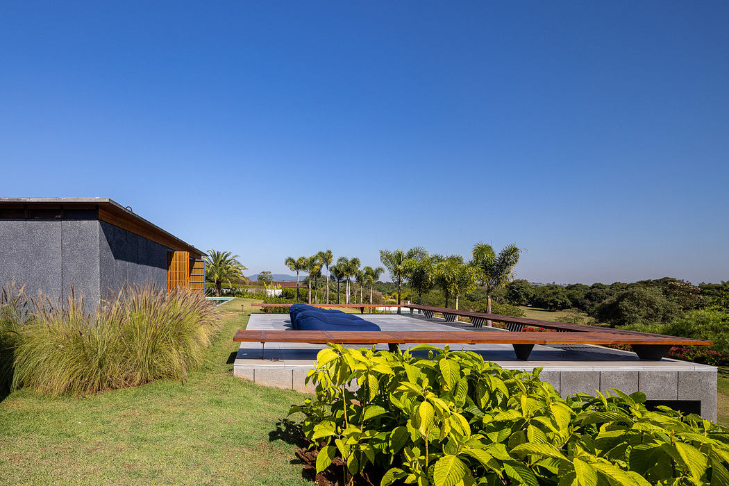 Contemporary home with landscaped garden and sleek outdoor pool.