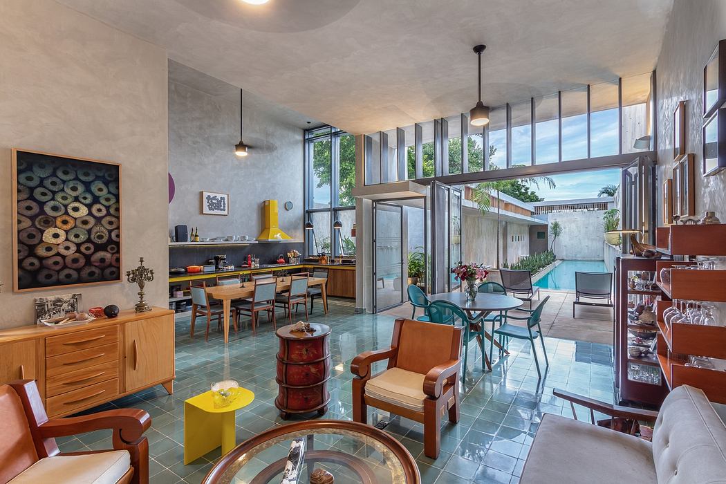 Contemporary living space with eclectic furniture and open plan layout.