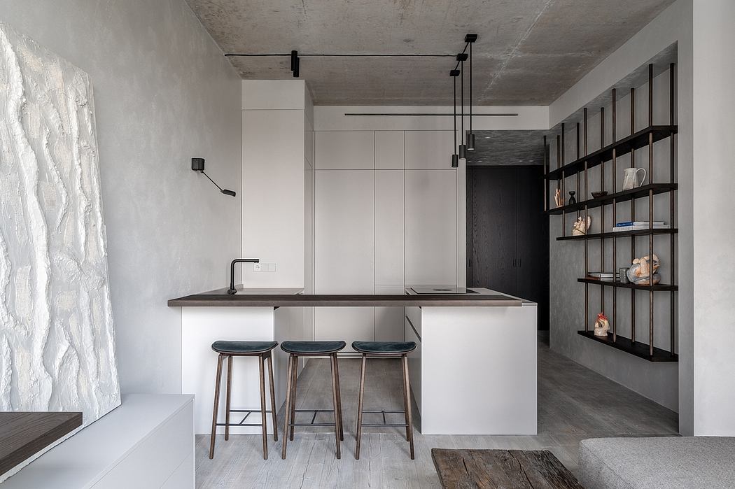 Modern kitchen with minimalist design, featuring a central island and open shelving.
