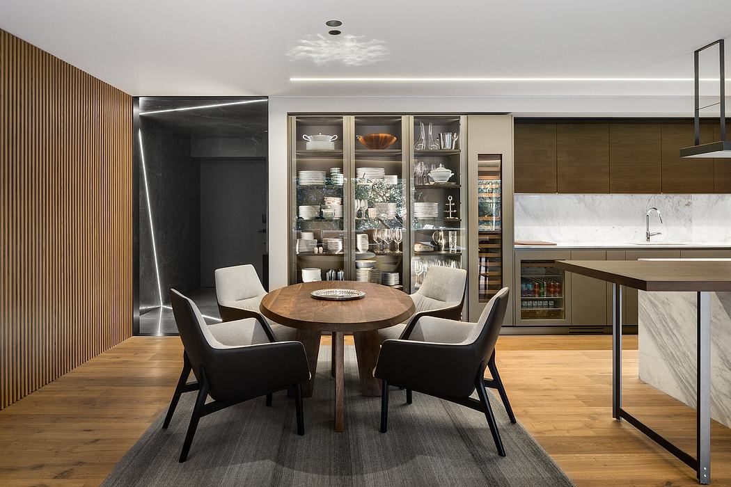 Modern kitchen with dining area and wooden accents.