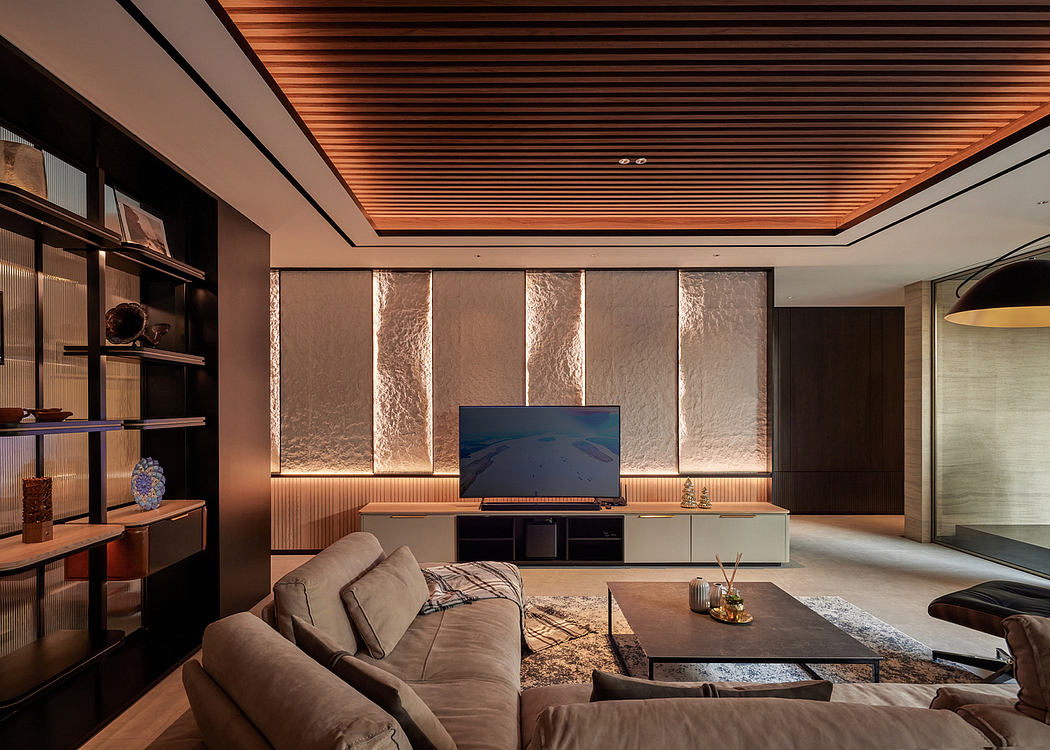 Contemporary living room with sleek wood ceiling and ambient lighting.