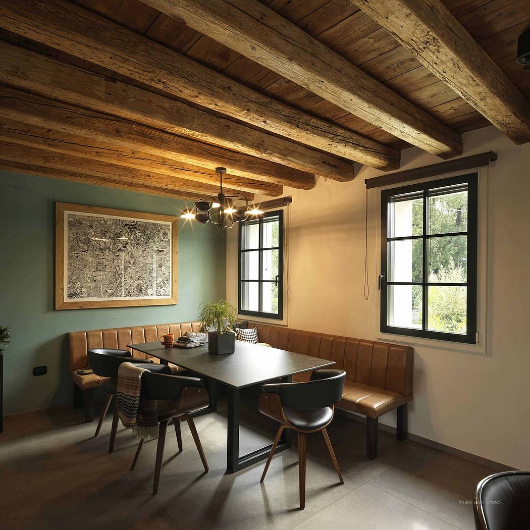 Rustic dining space with exposed wooden beams and a minimalist decor.