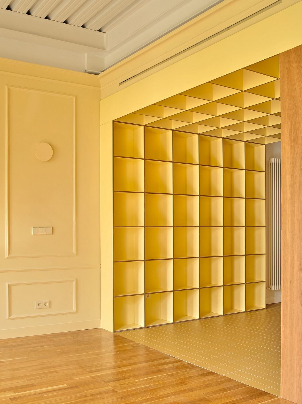 Contemporary room with a yellow translucent partition wall.