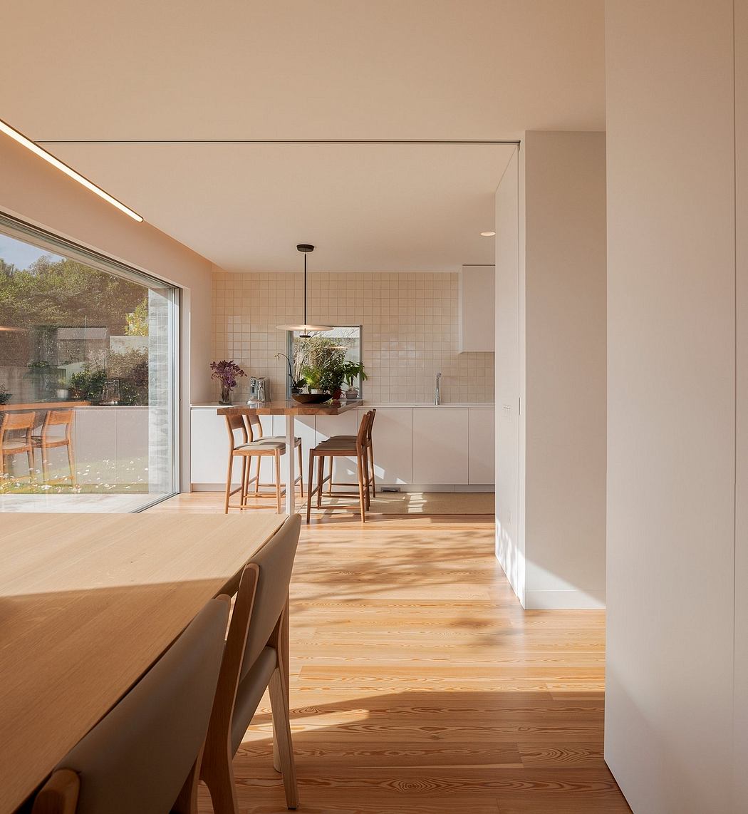 Minimalist dining area with clean lines and natural light.