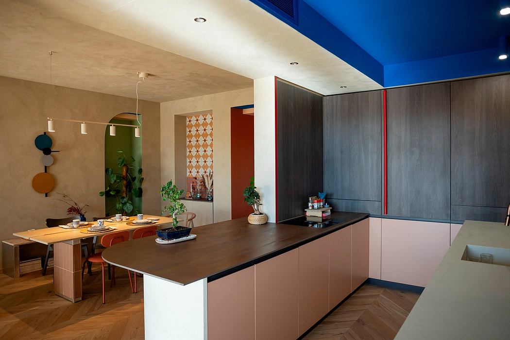 Contemporary kitchen with sleek cabinetry and colorful accents.