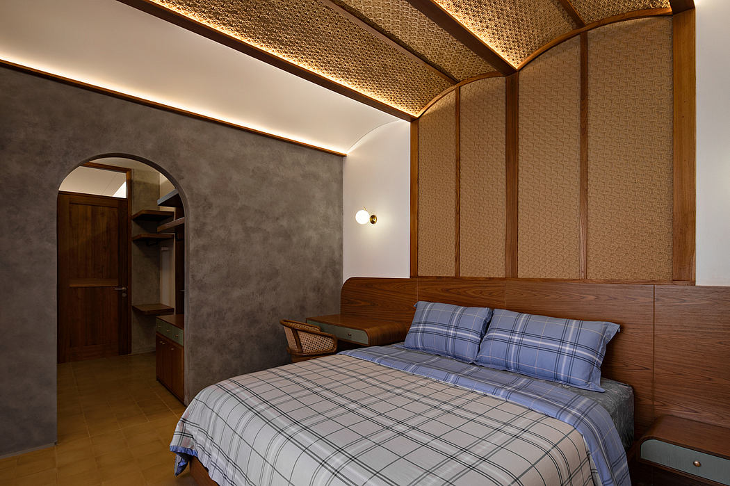 Modern bedroom with patterned ceiling, wooden headboard, and checked bedding.