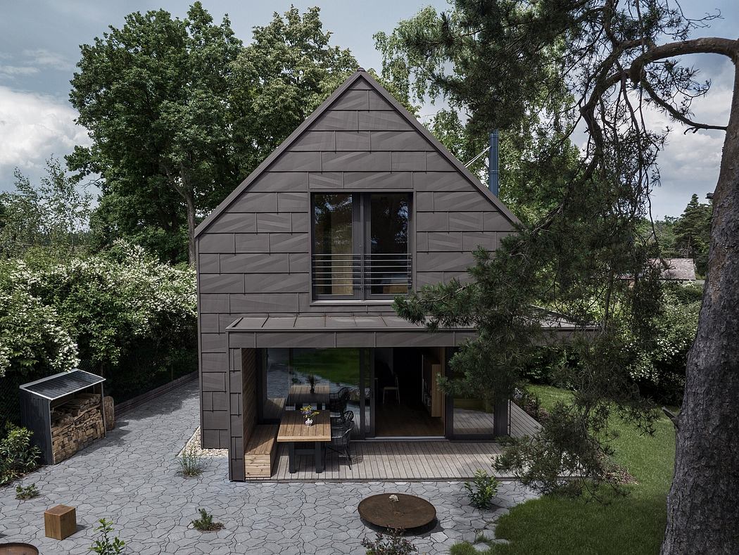 Contemporary A-frame house with large glass doors and a shaded patio area.