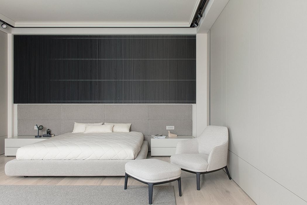 Minimalist bedroom with neutral tones, clean lines, and contemporary furniture.