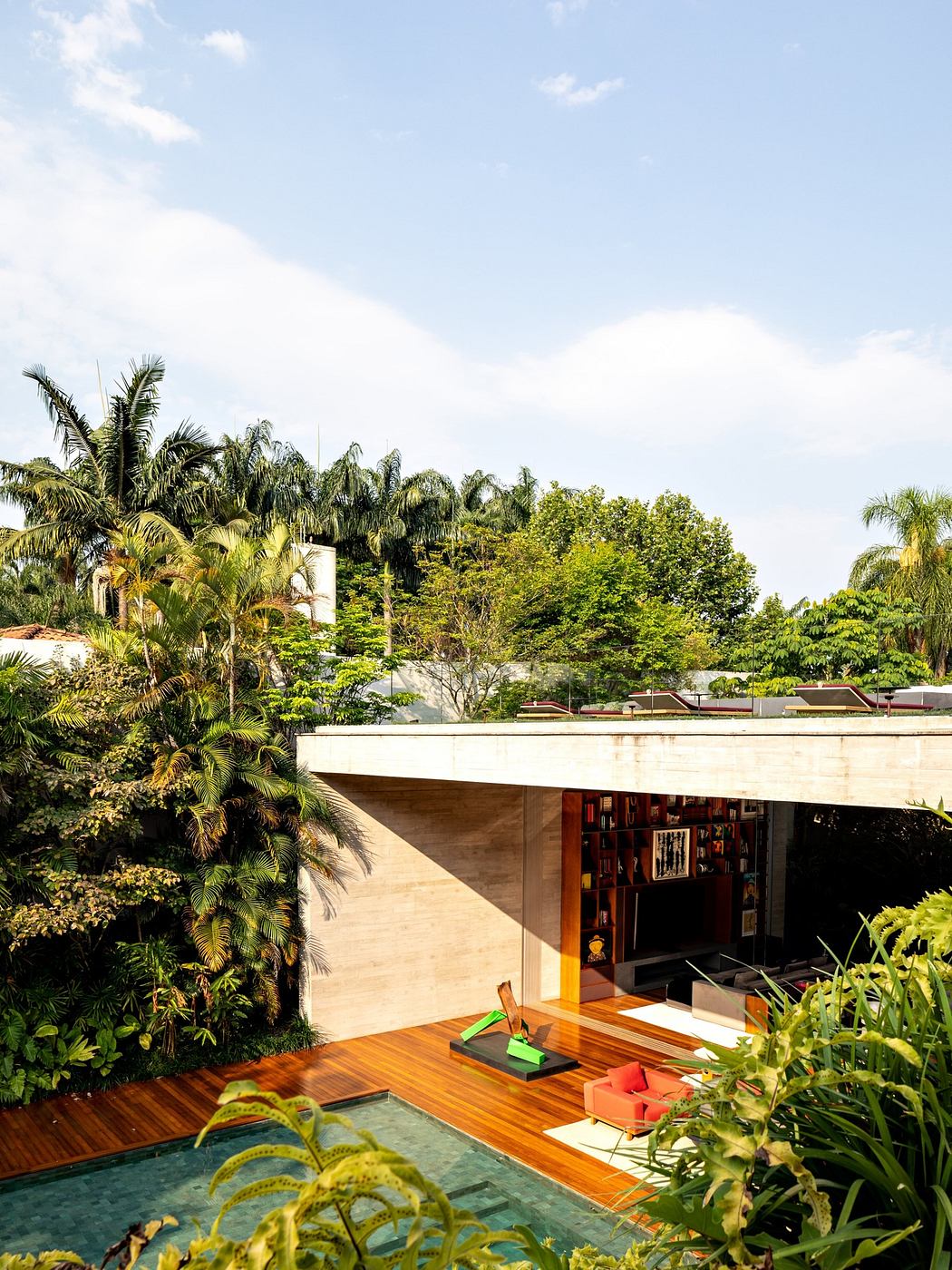 Contemporary house with lush garden and open patio.