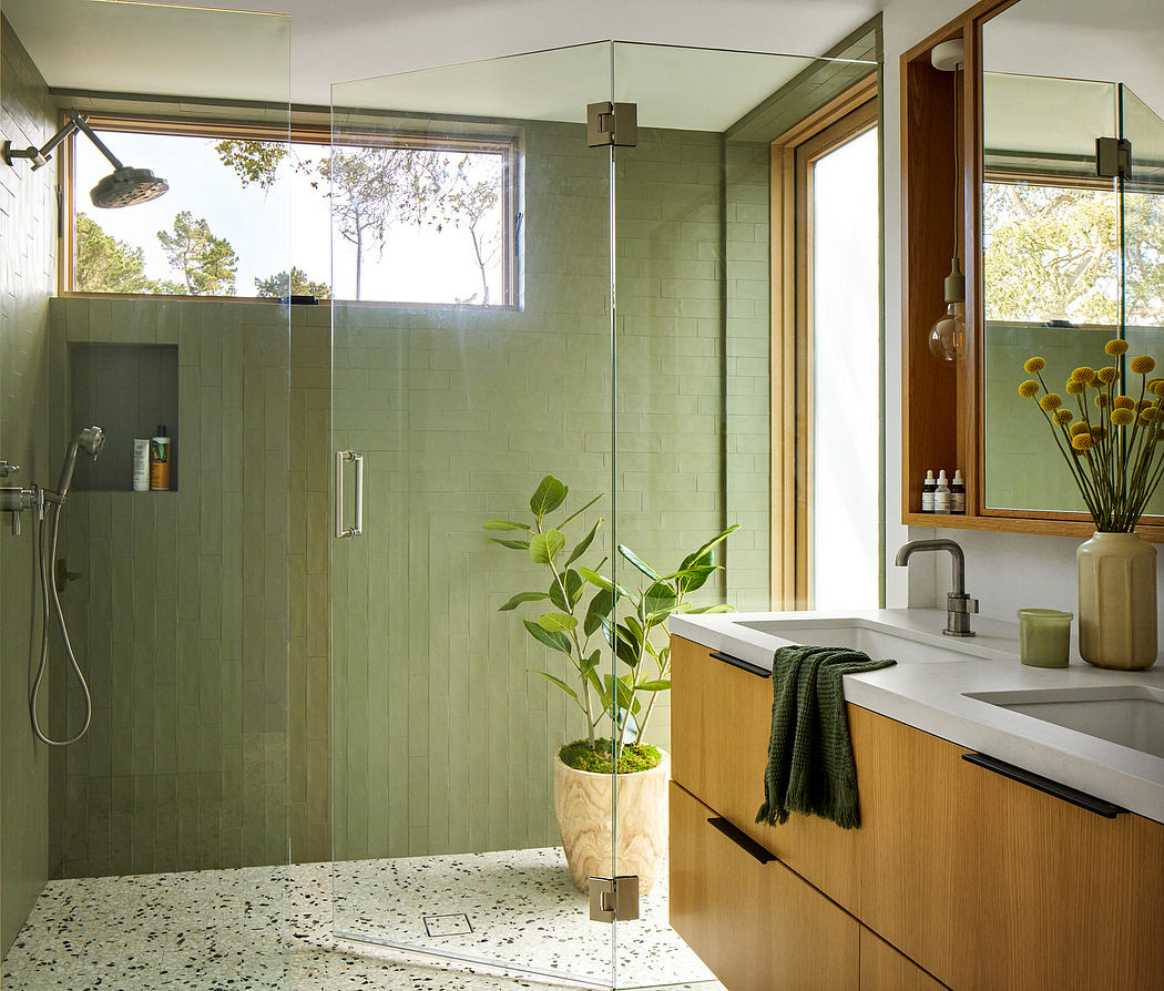 Modern bathroom with walk-in shower and wooden vanity.