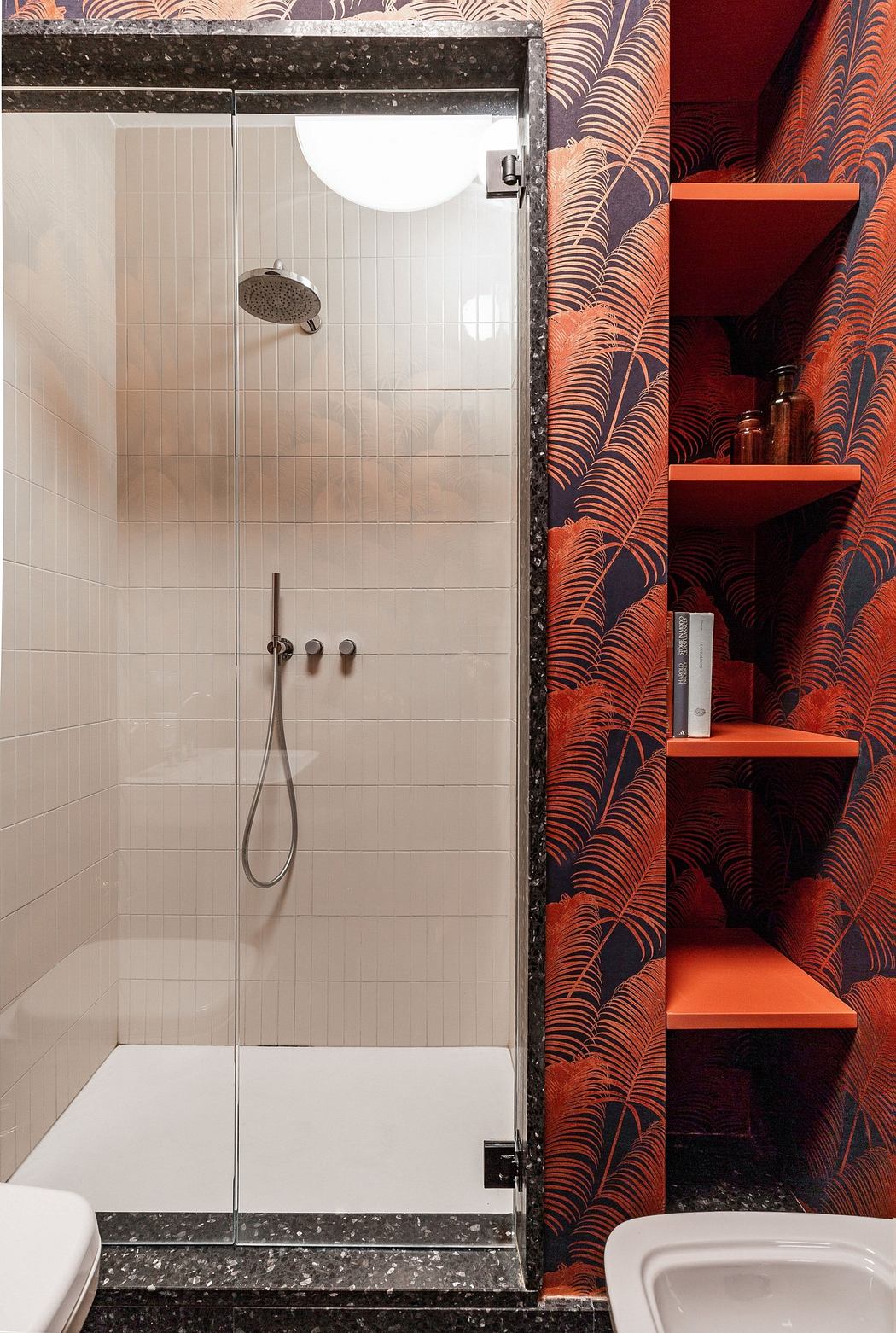 Contemporary bathroom with patterned wallpaper and built-in shelves.