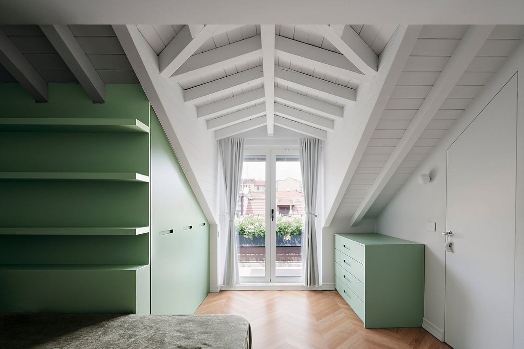 Minimalist attic room with green shelves and exposed white beams