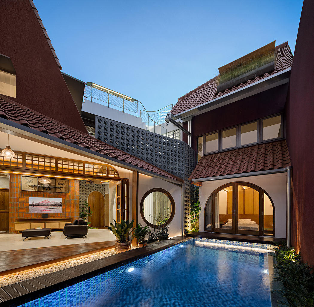 Contemporary home with a pool, distinctive arched doorways, and terrac