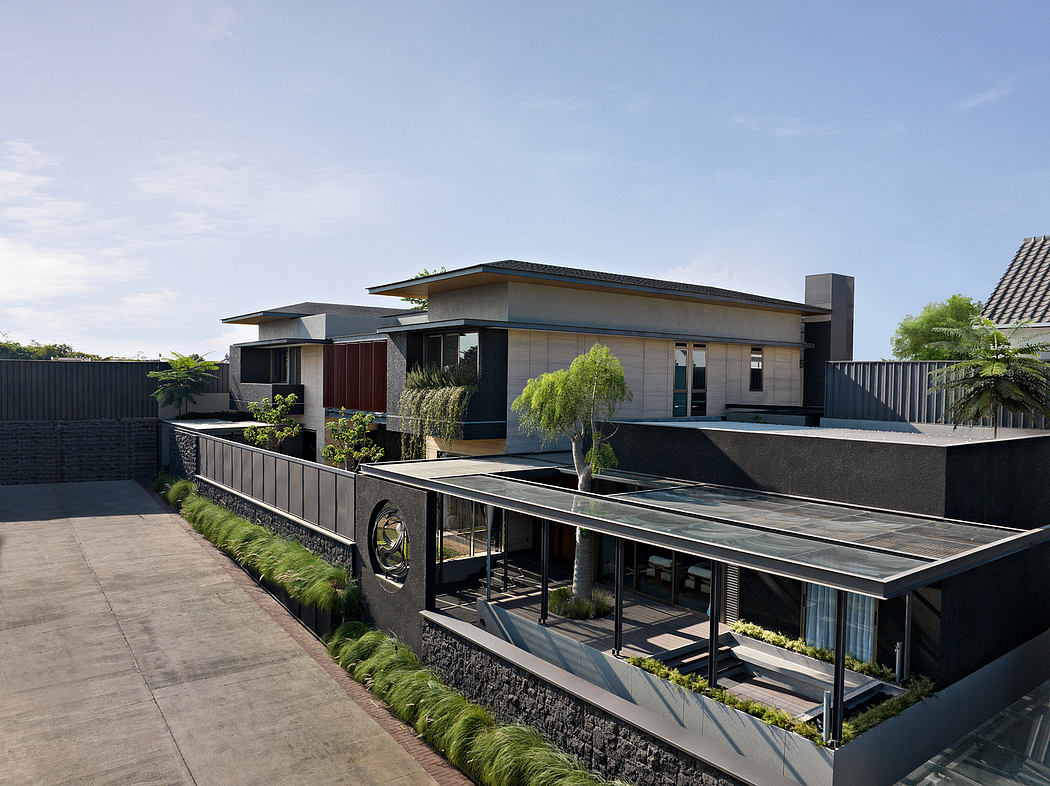 Sleek contemporary house with flat roofs and landscaped garden.