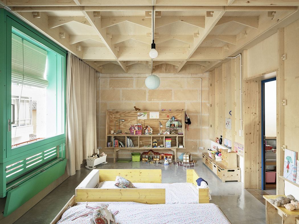 Modern minimalist wooden room with toys and a green window shutter.