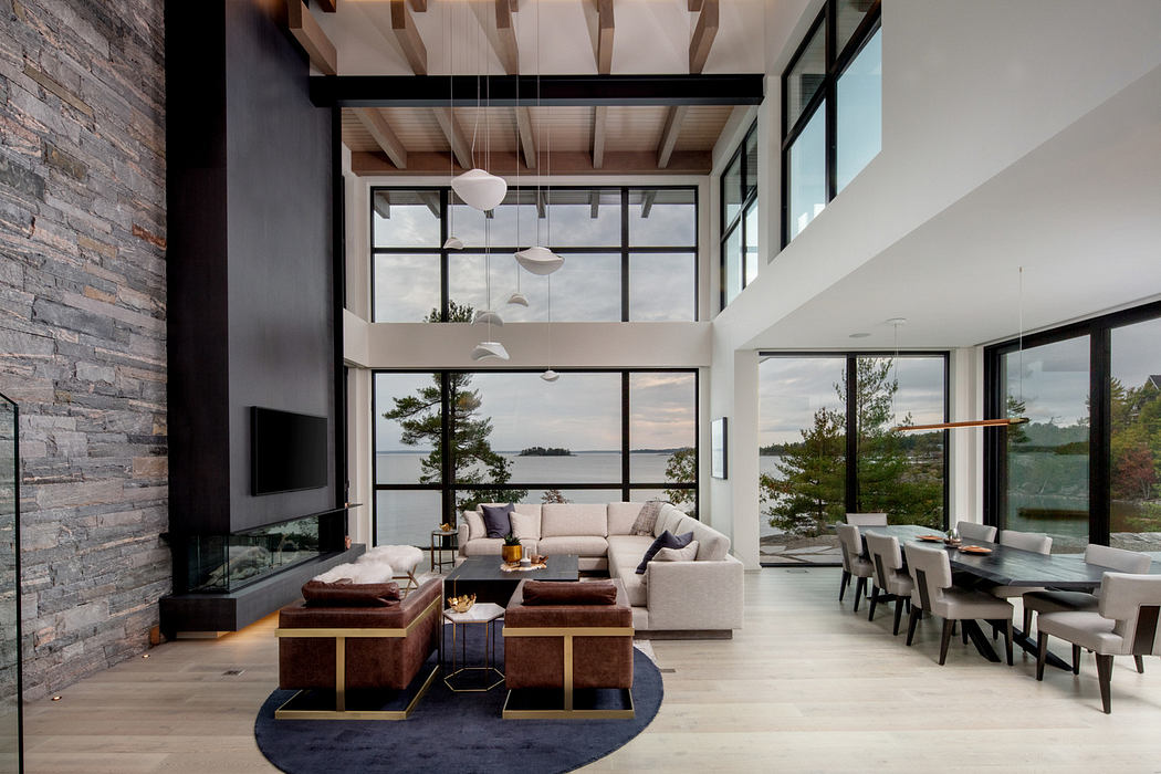 Contemporary living space with high ceilings and large windows