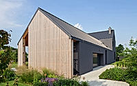 001-gray-house-polands-modern-architectural-marvel-in-swierczyniec.jpg