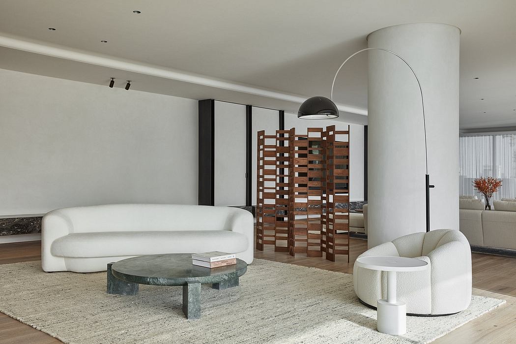Minimalist living room with sleek furniture, geometric shelving, and warm lighting.