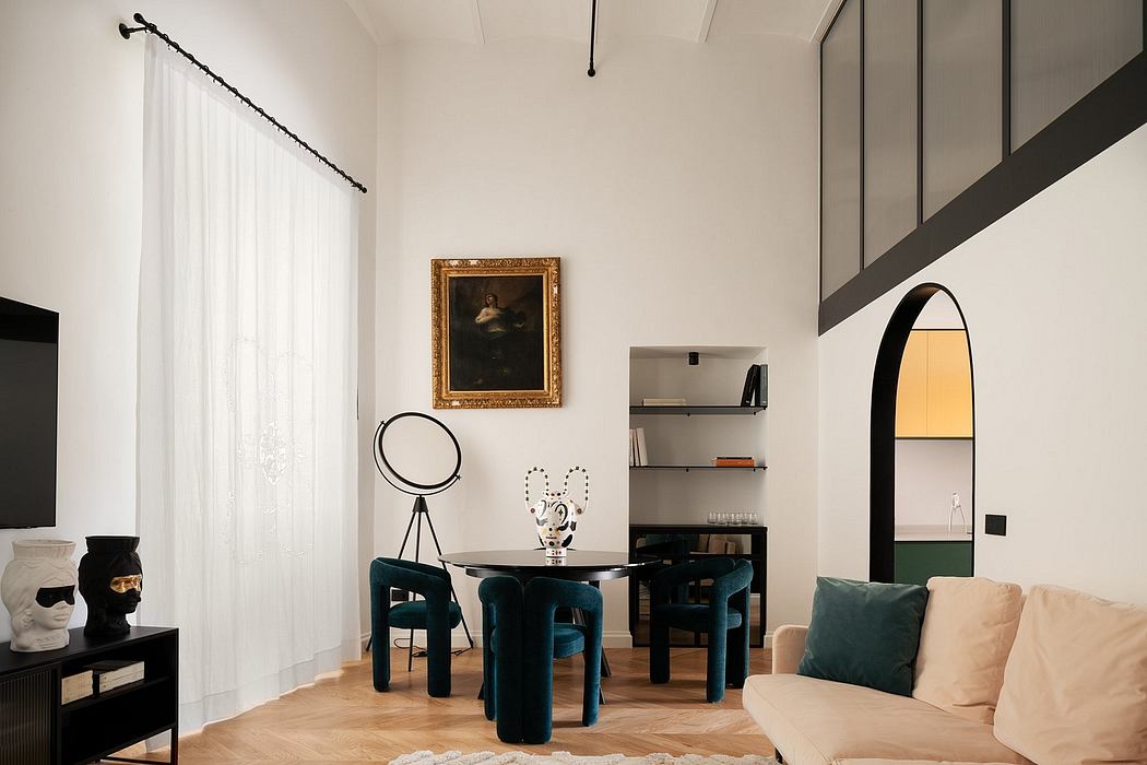 Contemporary living room with high ceiling and arched doorway.